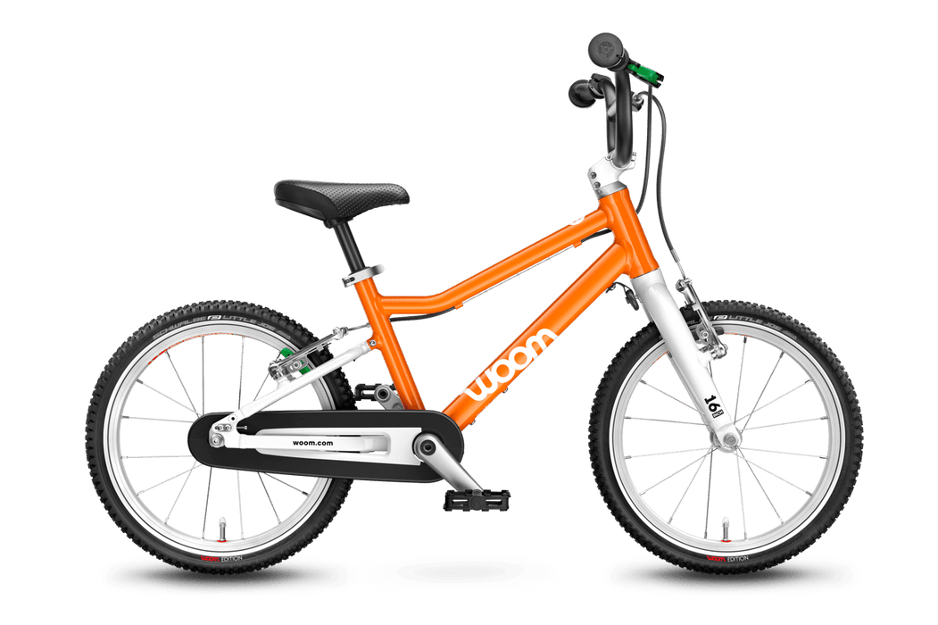 Woom 3 Original Kids Bike (16" Single Speed) in Flame Orange - Profile view of bike